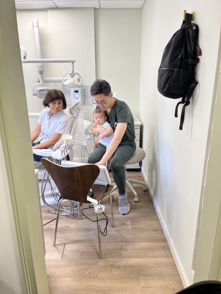 Dr. Shin reviewing images in the treatment room