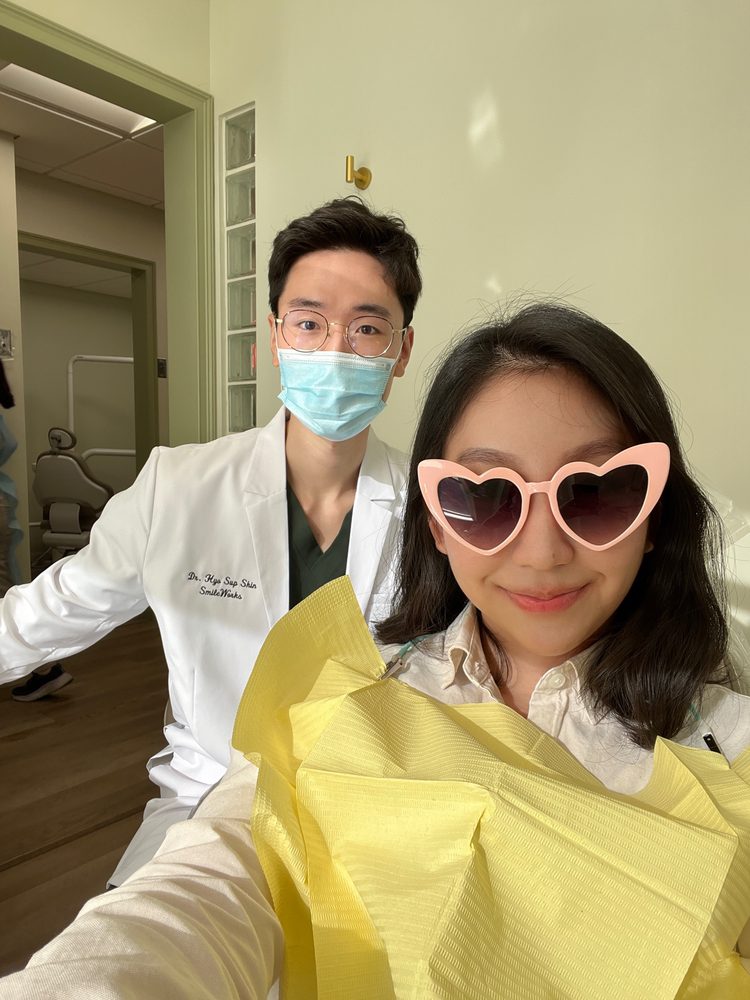 Dr. Shin with a patient after treatment