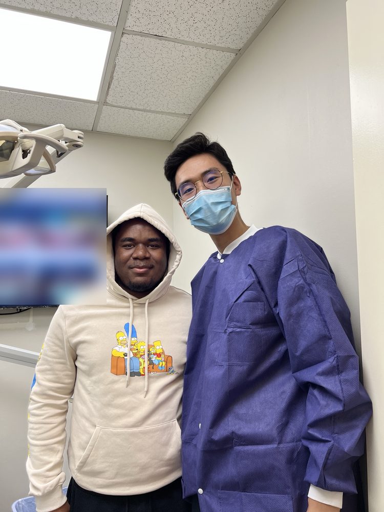 Dr. Shin with a patient