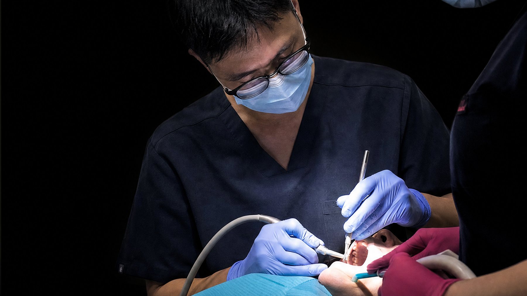 Dr. Peter Shin treating a patient at Shin Dental